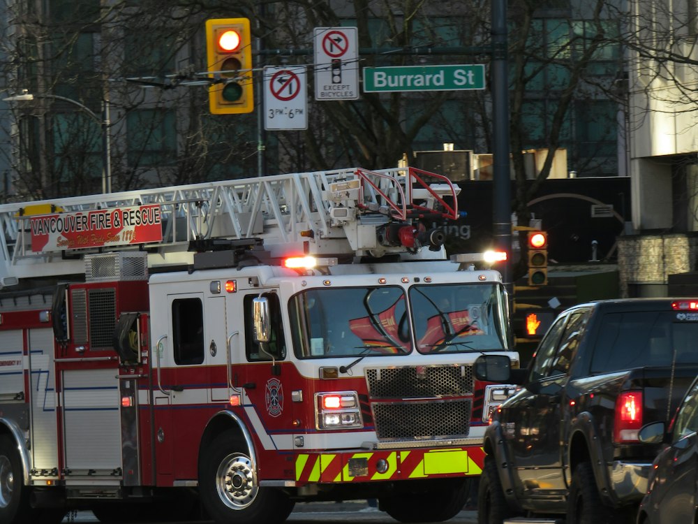 A fire engine and a police car on a Vancouver street